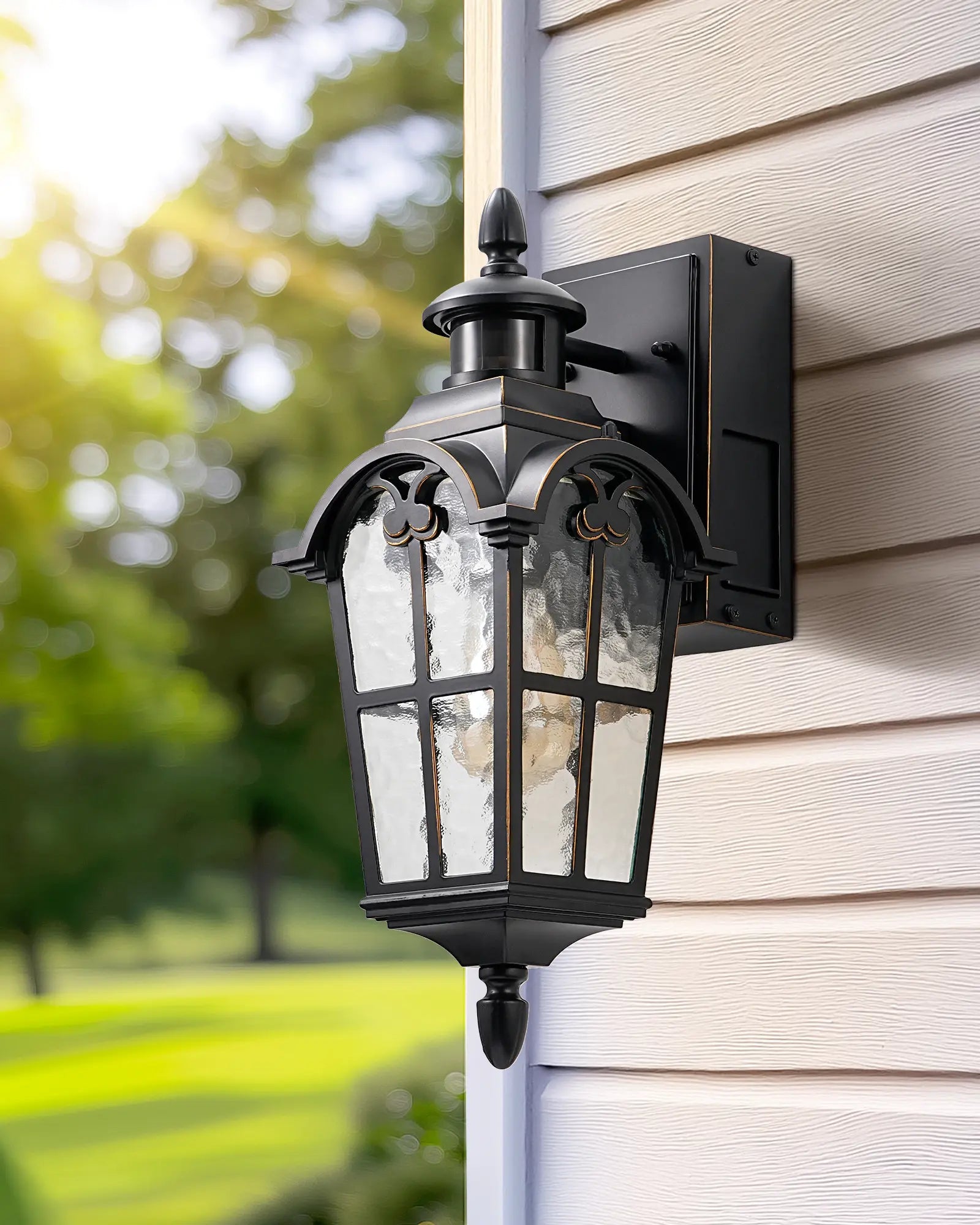 Motion Sensor Dusk to Dawn Outdoor Lights with GFCI Outlet on a house exterior with blurred greenery in the background.