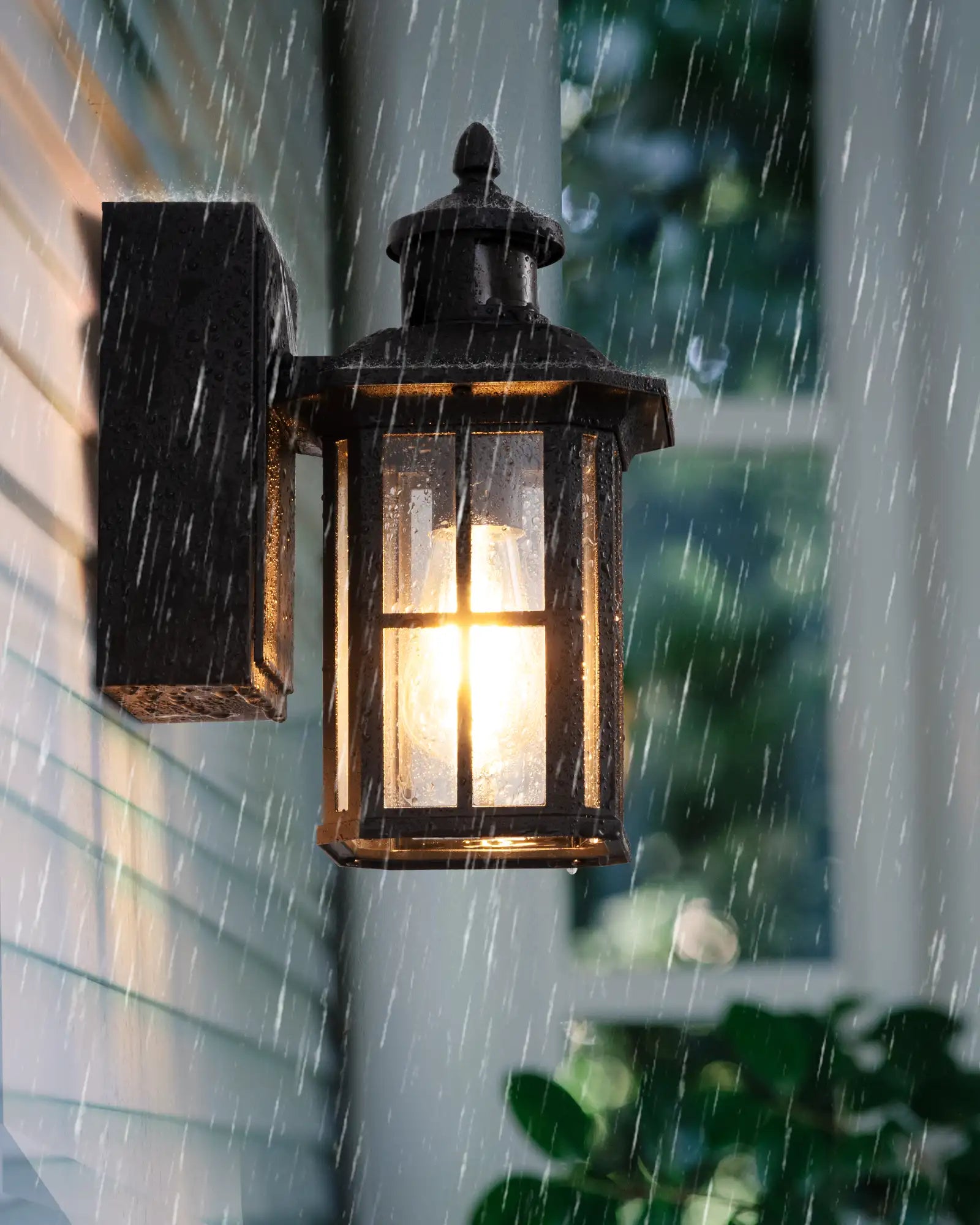 Dusk to Dawn Outdoor Wall Lights with Motion Sensor & GFCI Outlet on a house exterior during rain