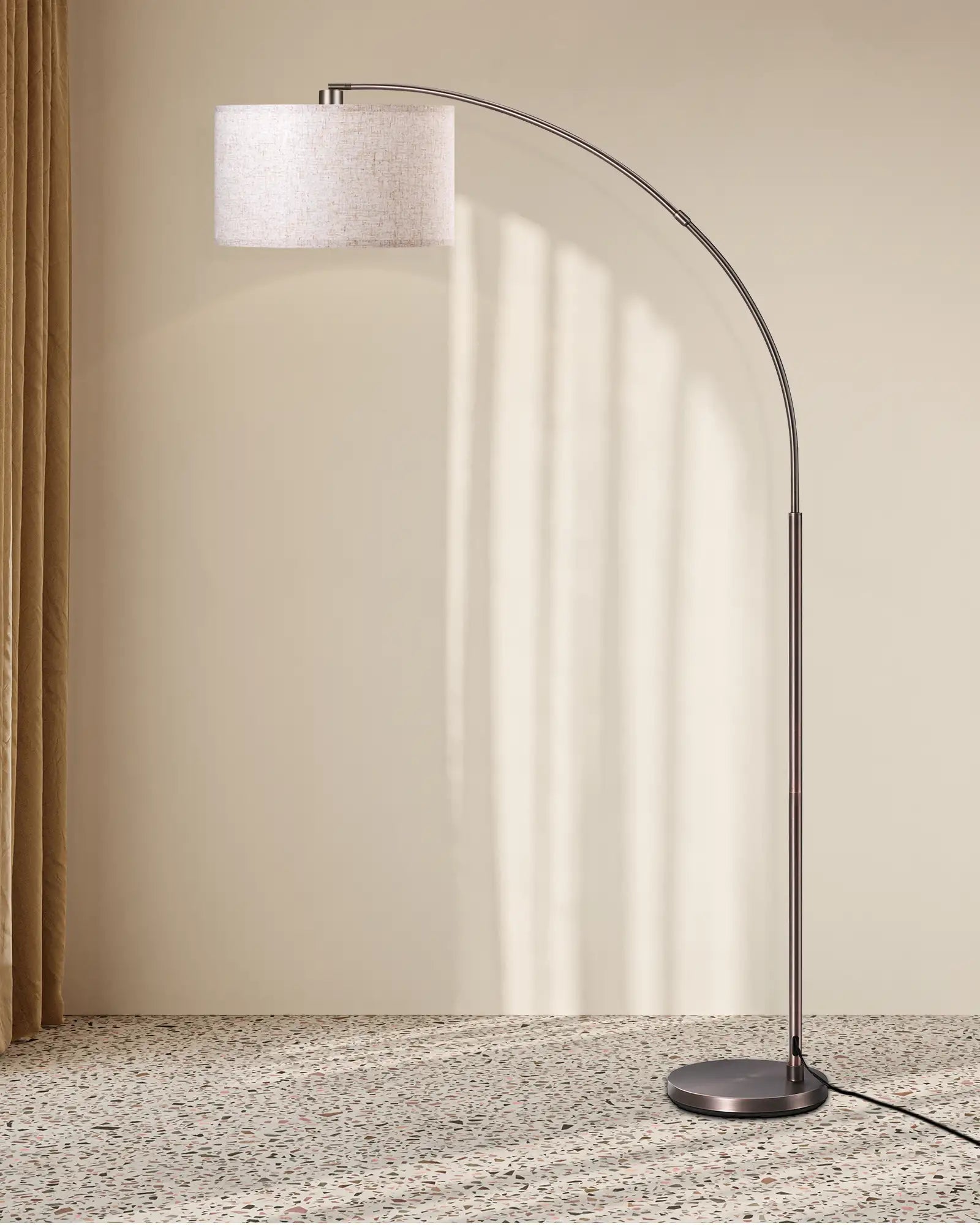 Arc floor lamp with a white shade in a room setting