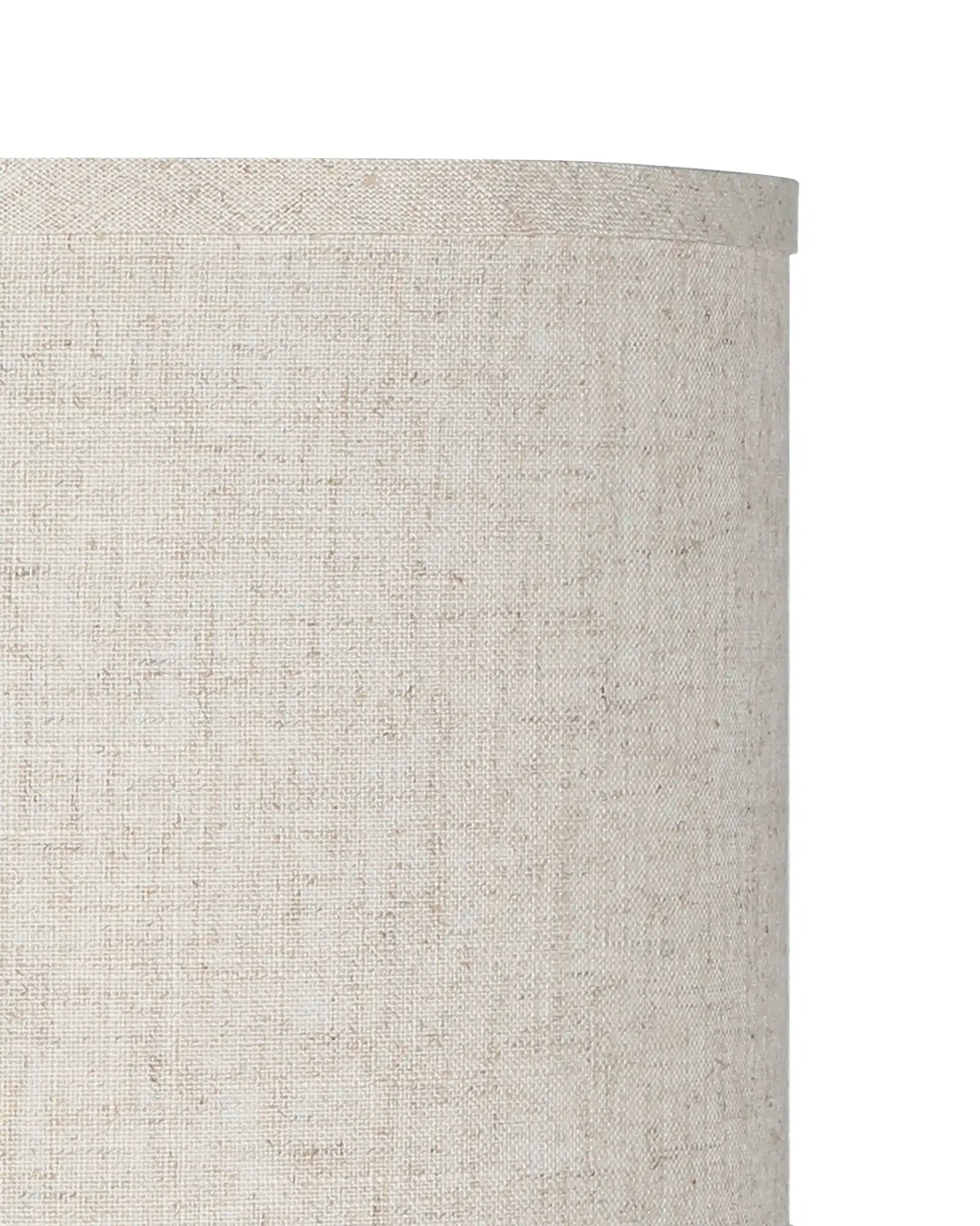 Close-up of a textured beige lampshade on a white background