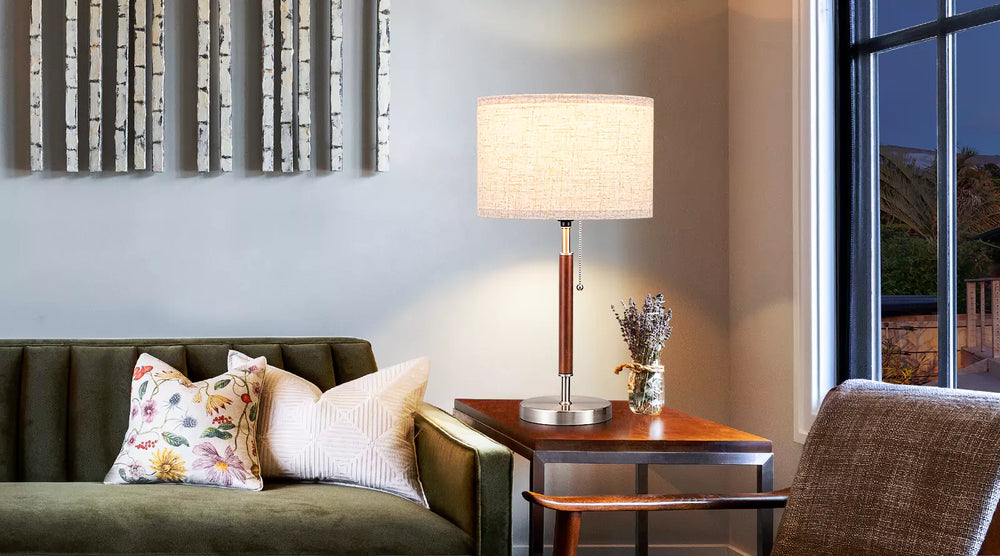 Living room with a Classic Solid Wood Table Lamp on a side table, sofa with pillows, and decorative elements.