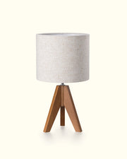 Table lamp with mahogany brown wooden base and flax linen Lampshade on a white background