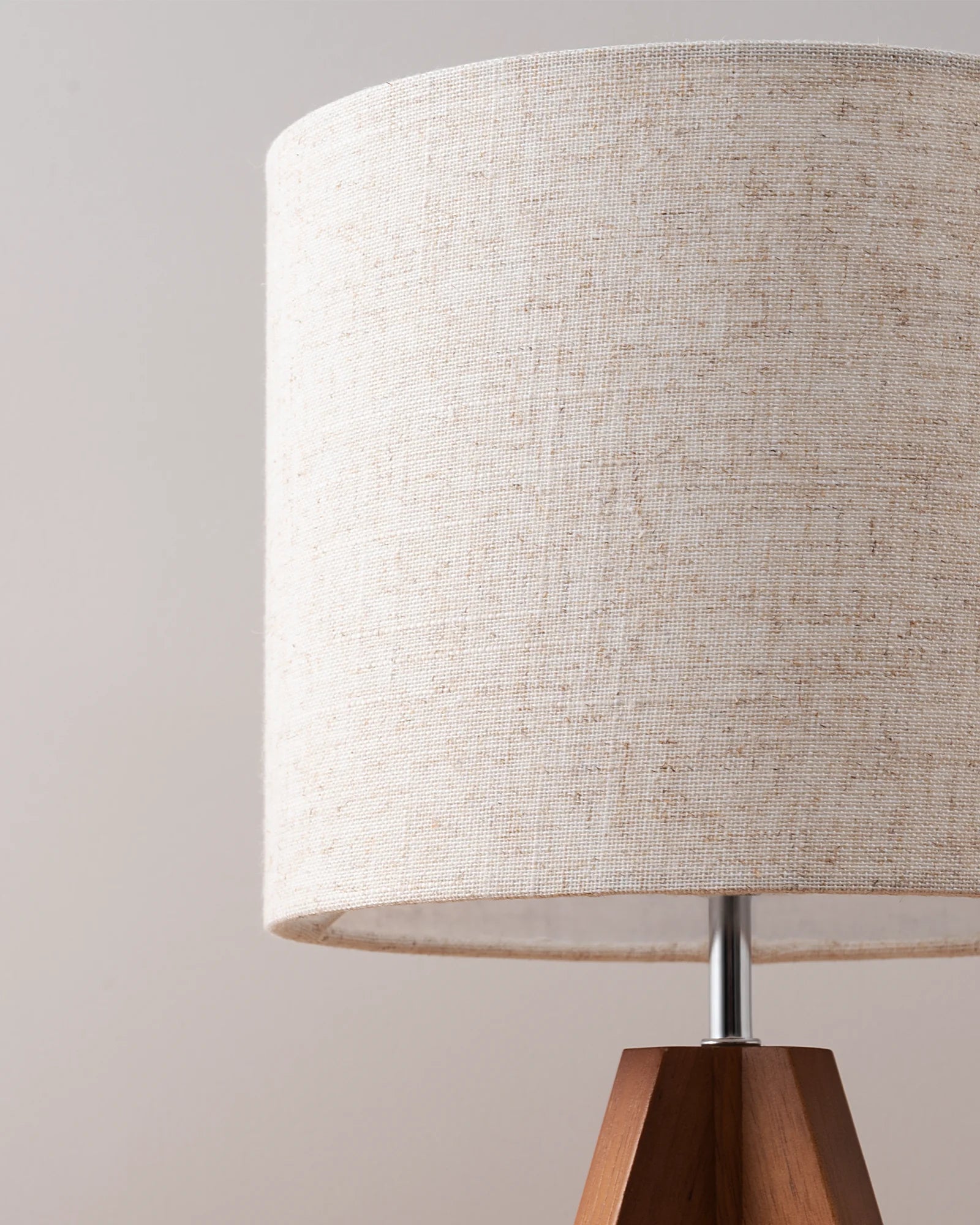 Table lamp with  flax linen Lampshade on a  plain background