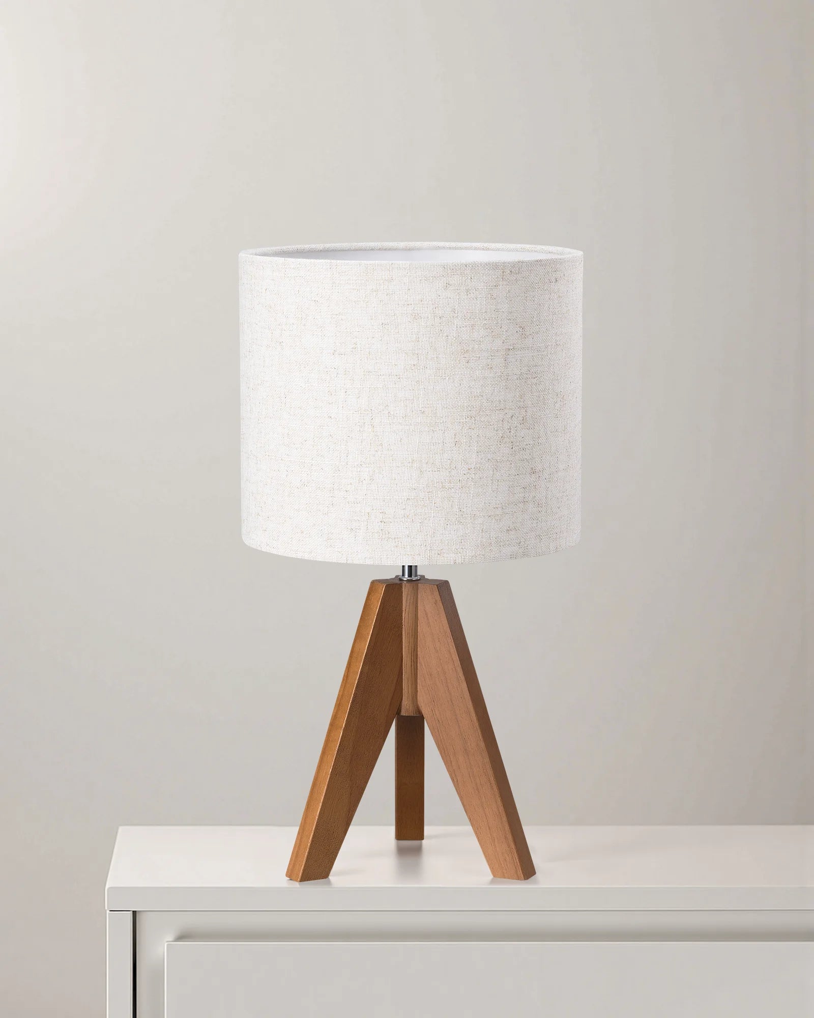 Natural Minimalism Table lamp with mahogany brown wooden base and flax linen Lampshade on a light gray background