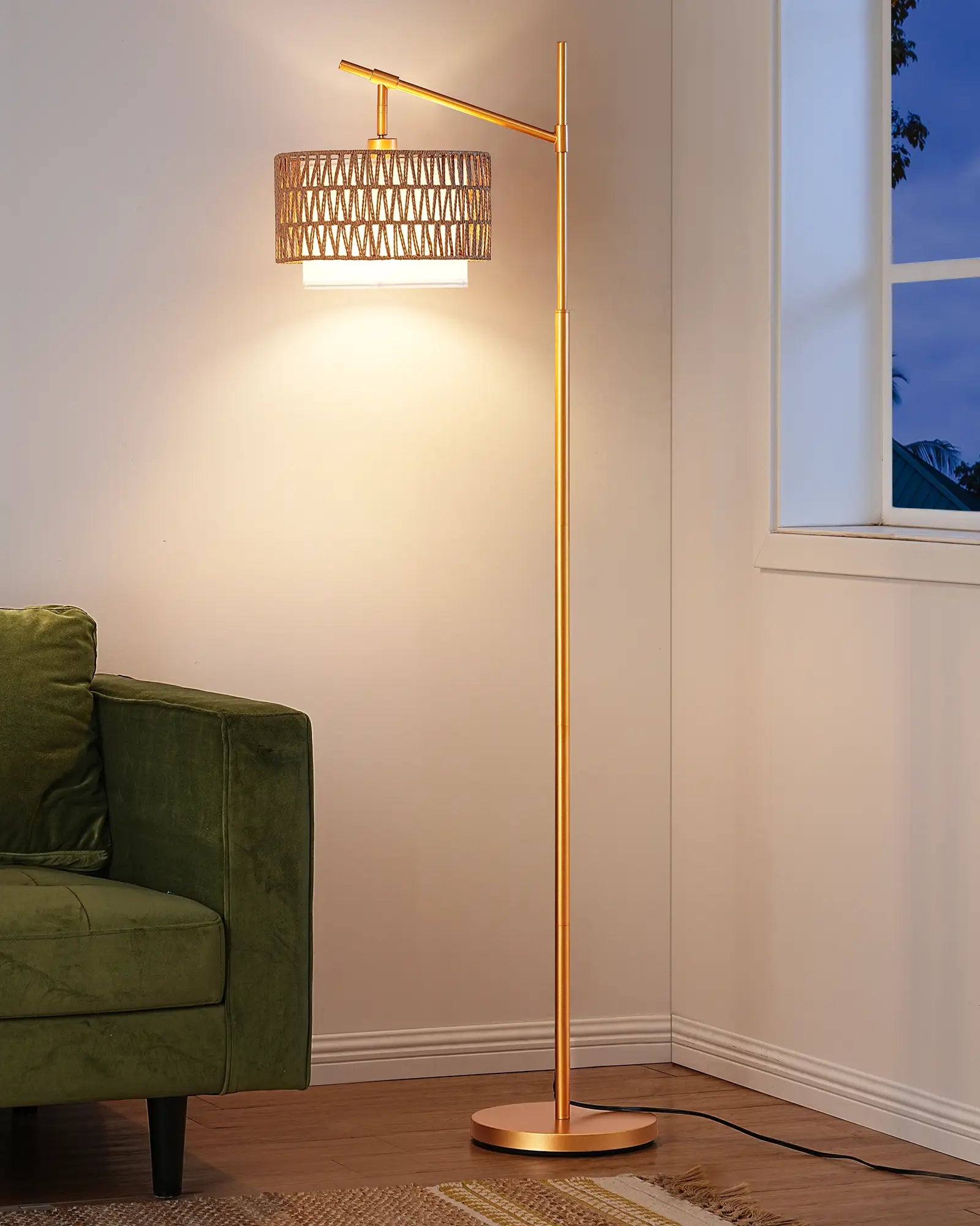 Gold Hanging Floor Lamp in a living room setting with a green couch.