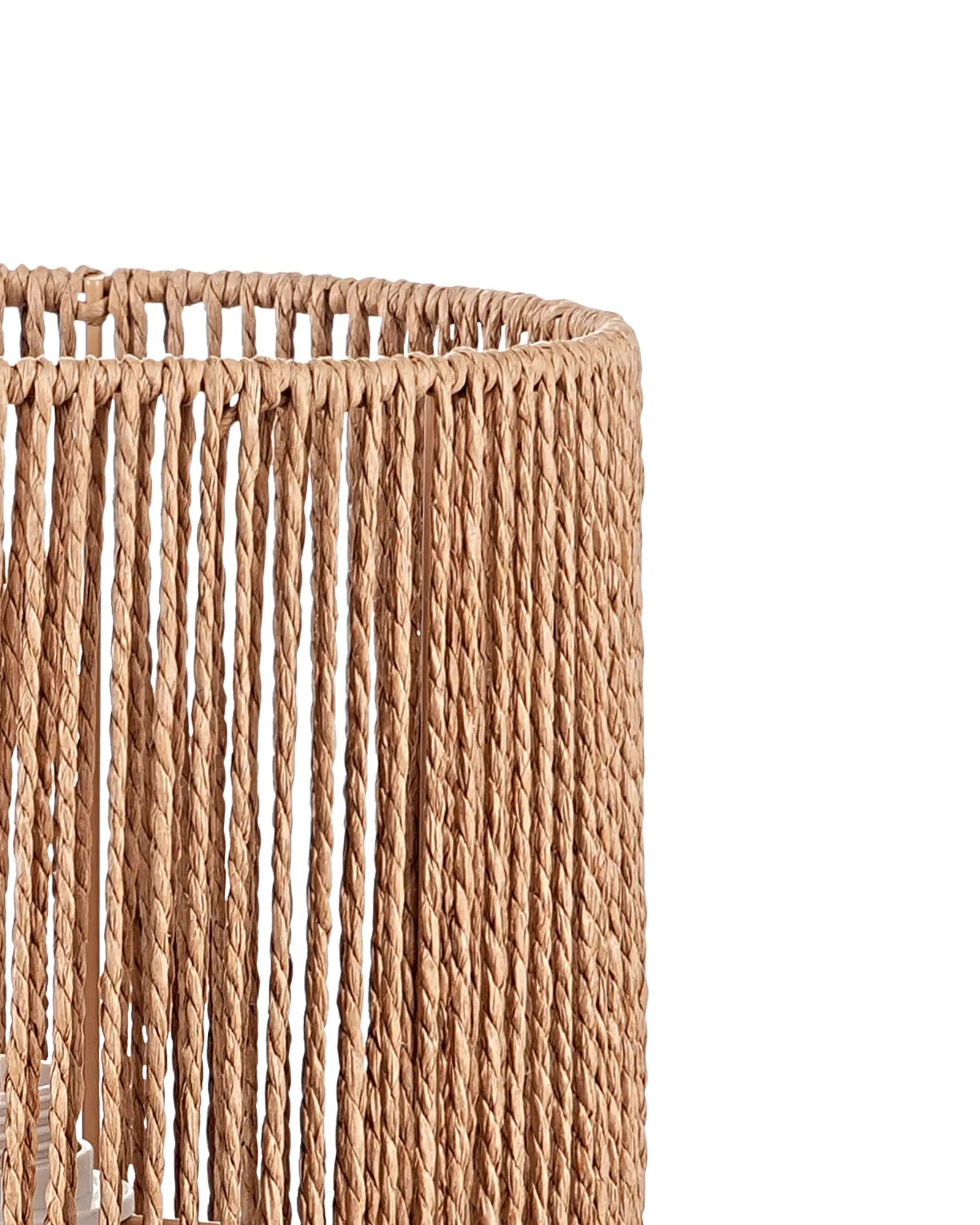 Close-up of a woven basket with natural fibers on a white background