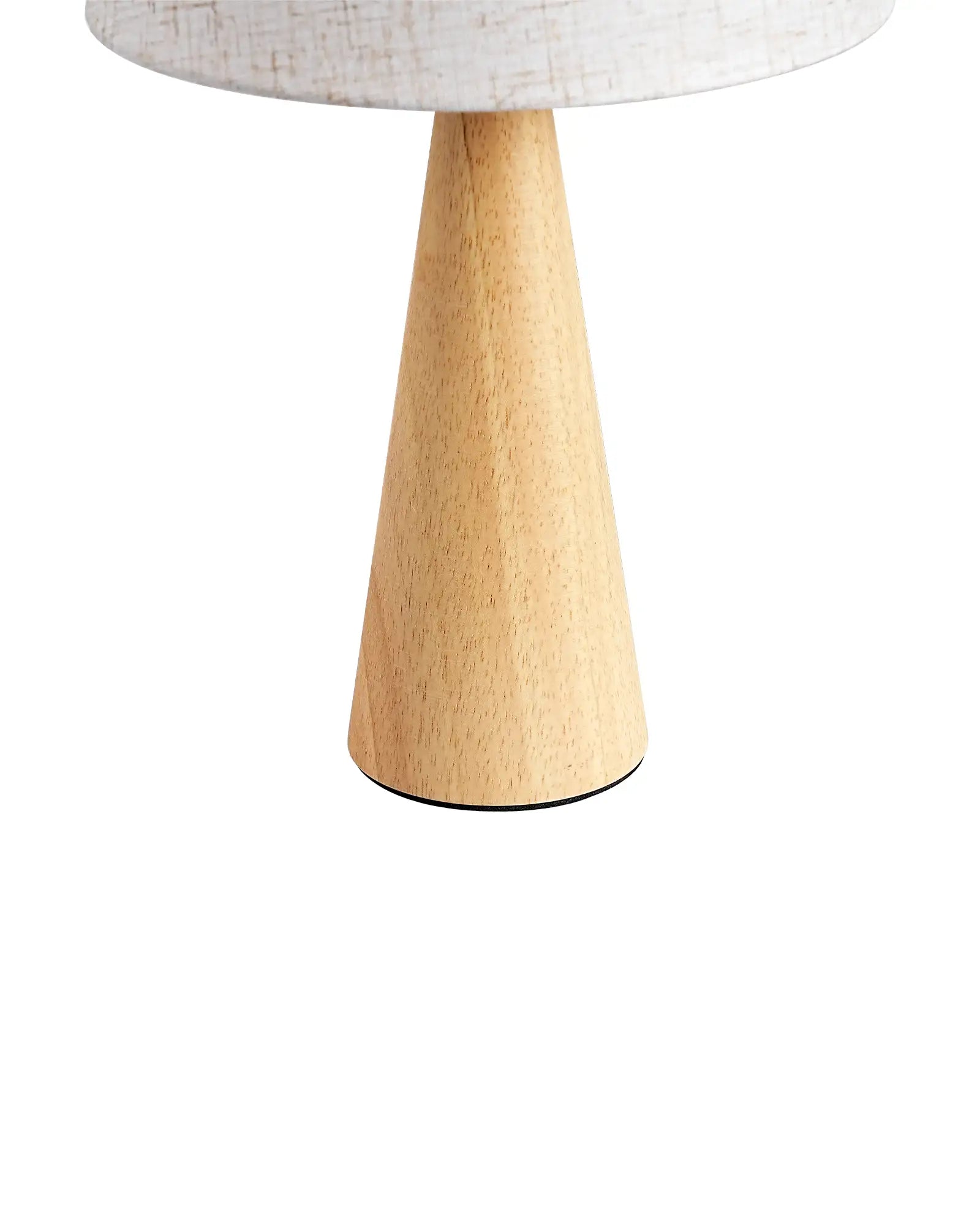 Wooden table lamp with a white lampshade on a white background