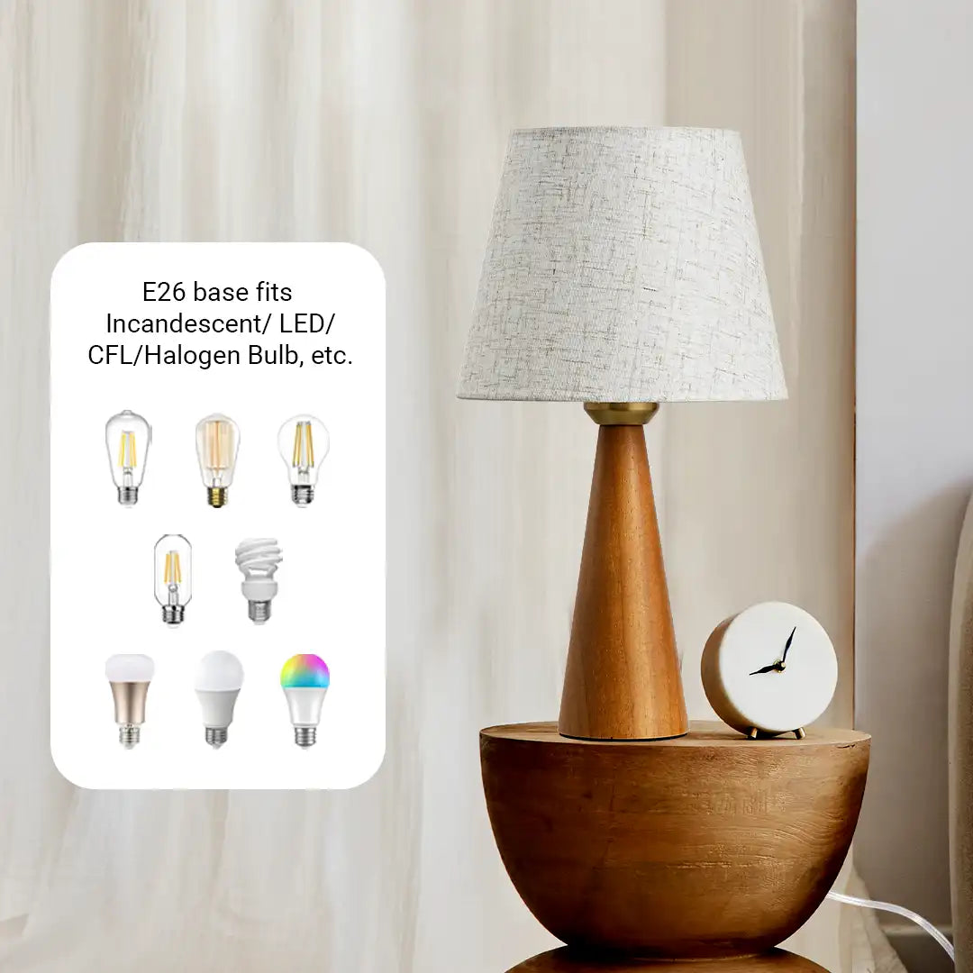 Wooden table lamp with white shade and clock on a neutral background