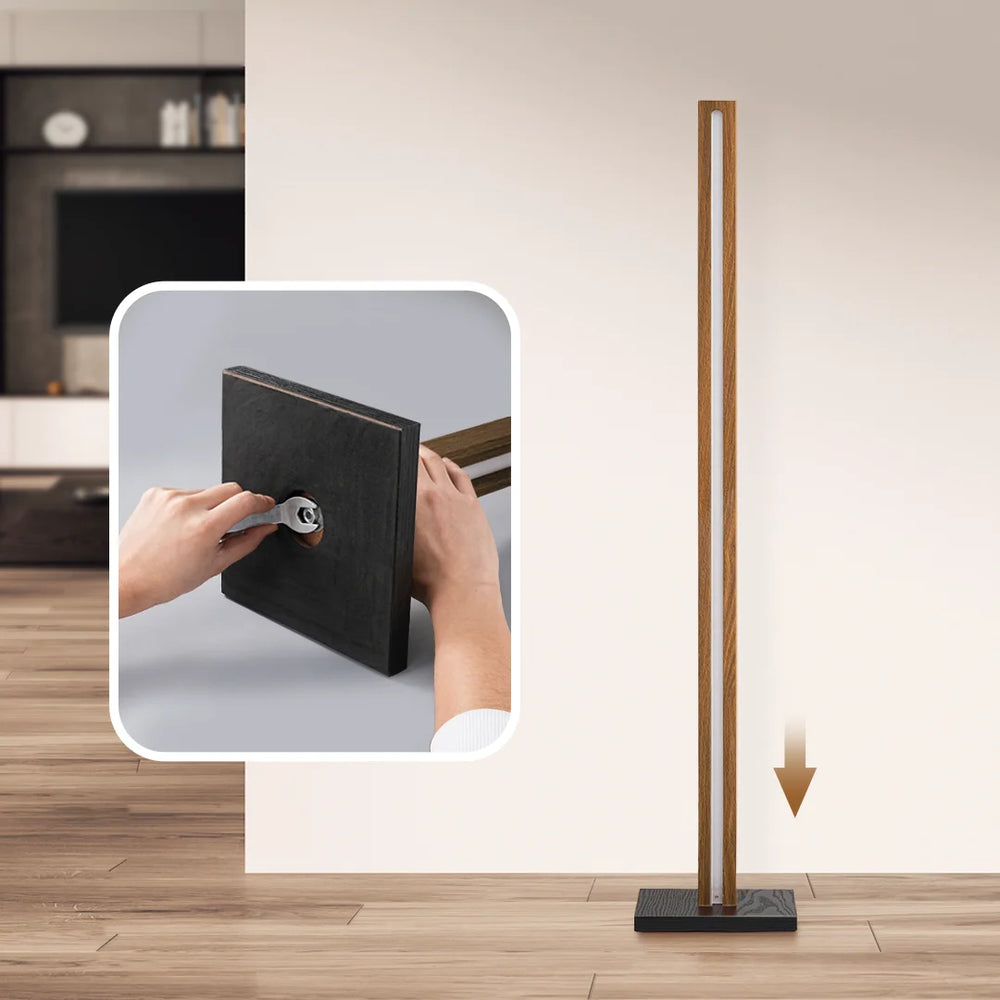 Floor lamp with a inset showing hands adjusting a panel, set against a neutral background.